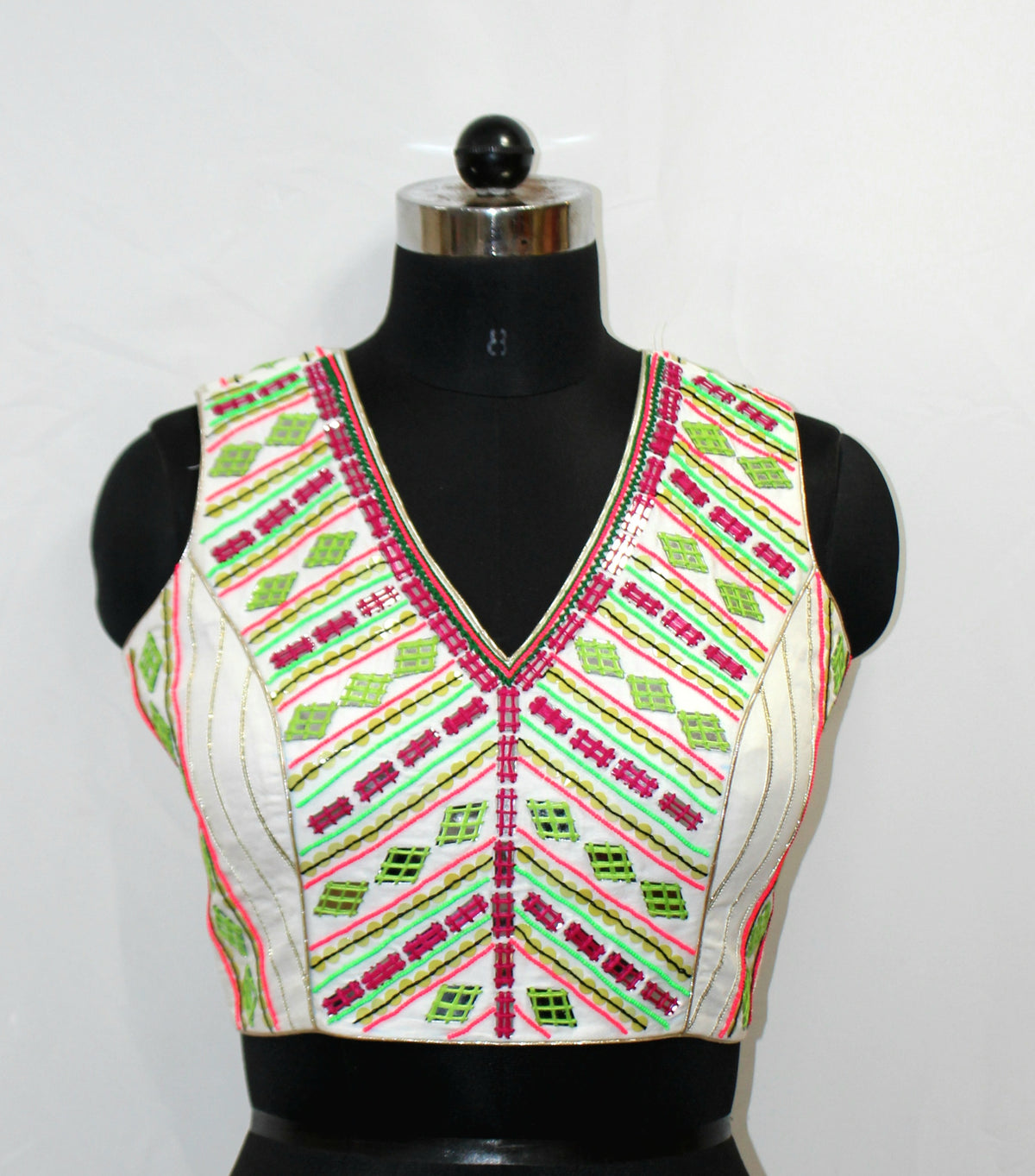 White Sleeveless Blouse with Hand, Lace & Mirror Work - LABEL KAVITA