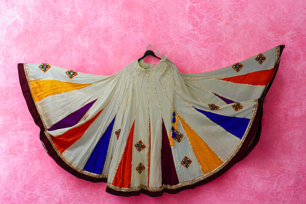White mixed with colorful kali and hand work