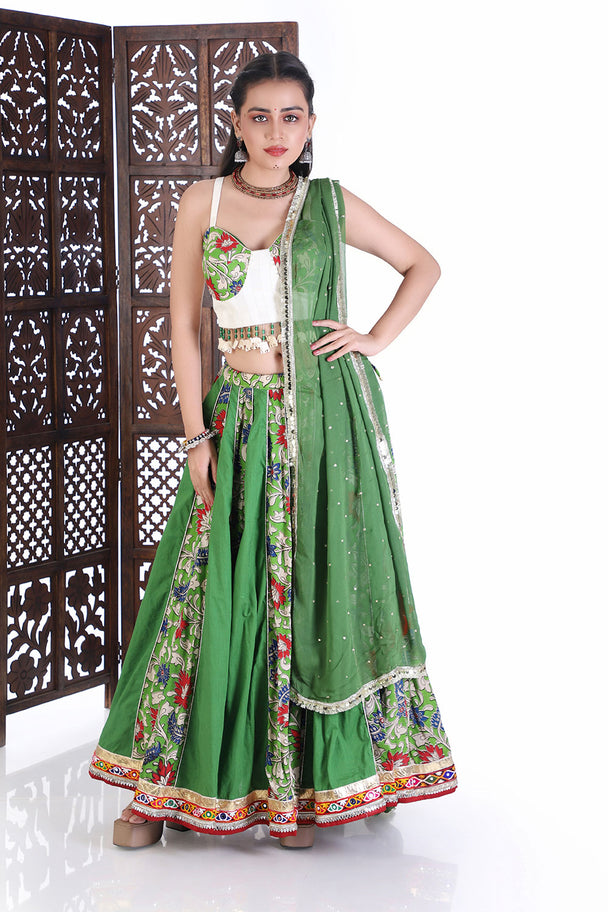 vibrant emerald floral lehenga choli with hand embroidered tassel blouse