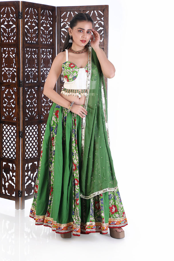 vibrant emerald floral lehenga choli with hand embroidered tassel blouse