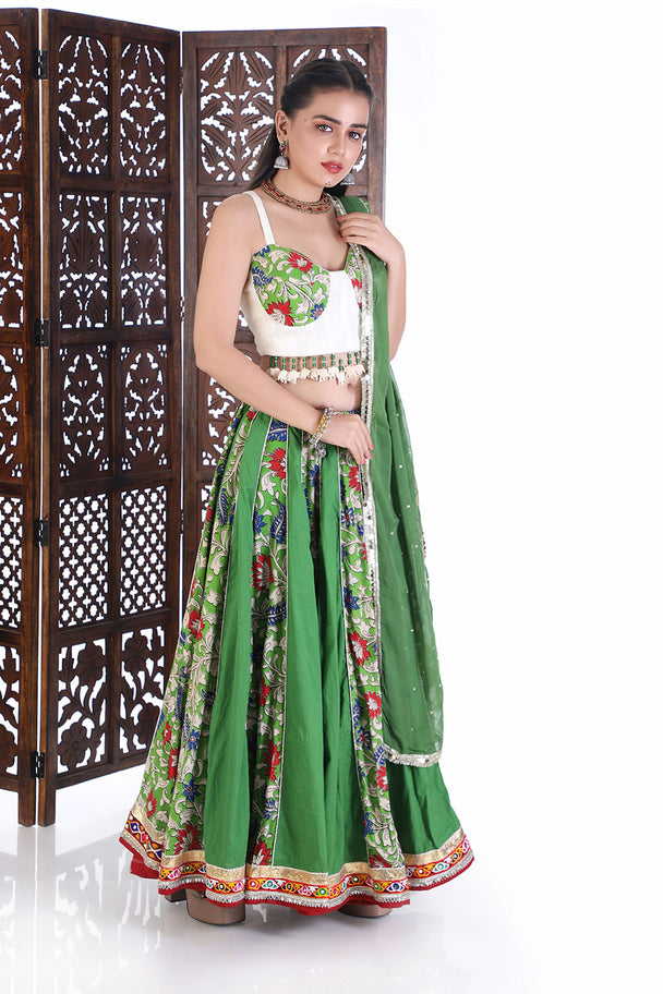 vibrant emerald floral lehenga choli with hand embroidered tassel blouse