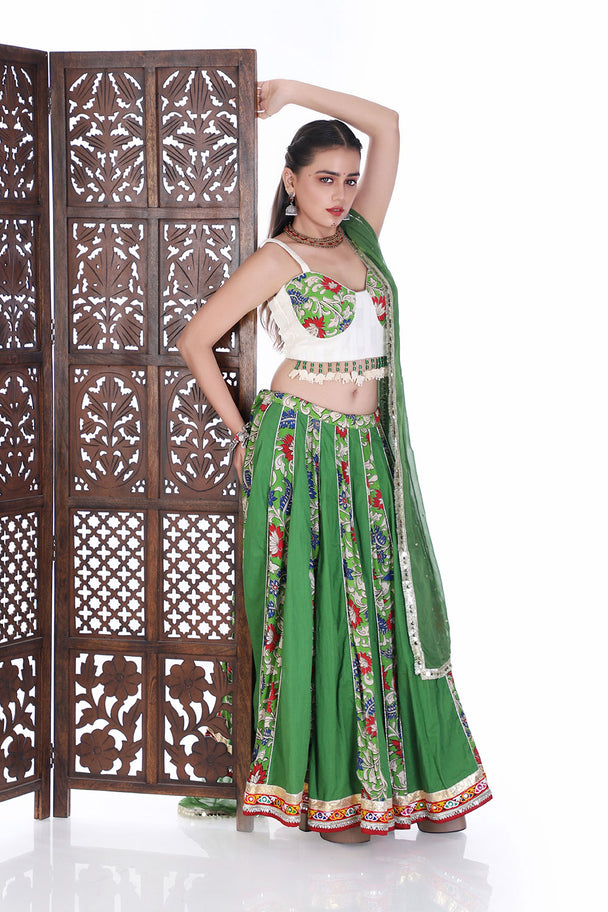 vibrant emerald floral lehenga choli with hand embroidered tassel blouse