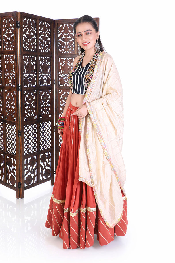 traditional navratri chaniya choli set - embroidered halter neck blouse & rust flared lehenga for weddings & festivals