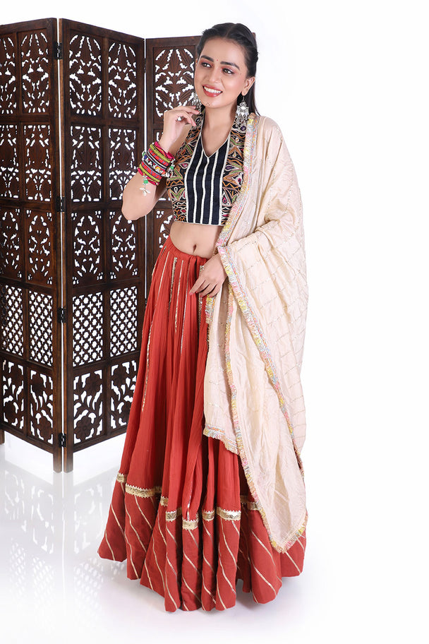 traditional navratri chaniya choli set - embroidered halter neck blouse & rust flared lehenga for weddings & festivals