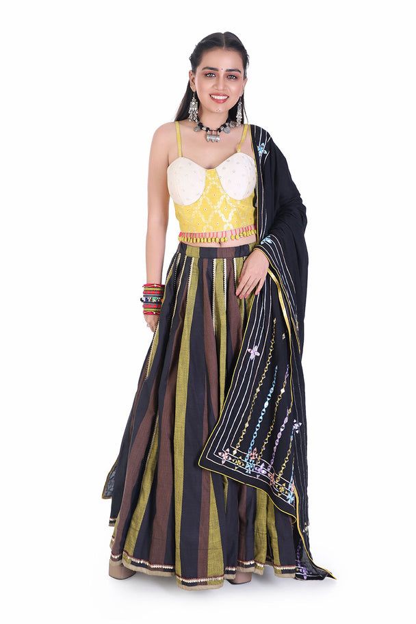 bold yellow tassel choli with lehenga and black mirror dupatta