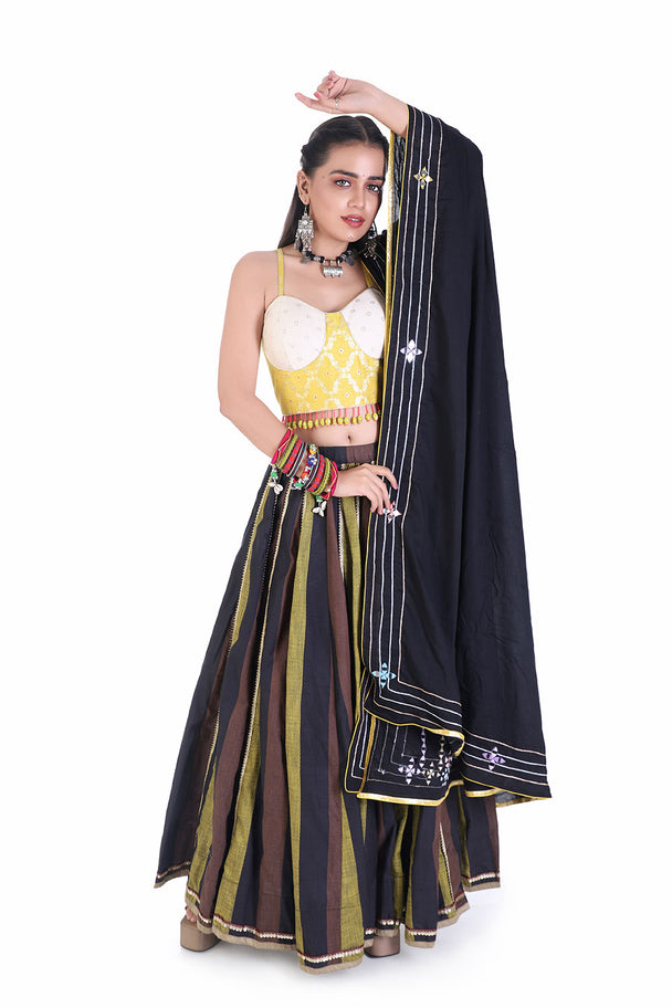 bold yellow tassel choli with lehenga and black mirror dupatta