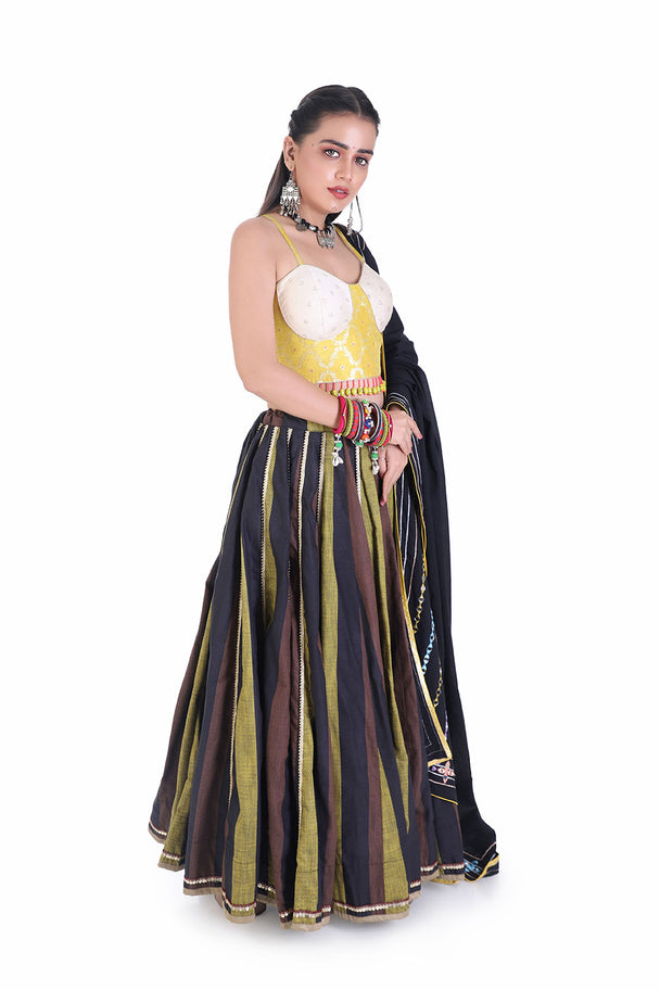 bold yellow tassel choli with lehenga and black mirror dupatta