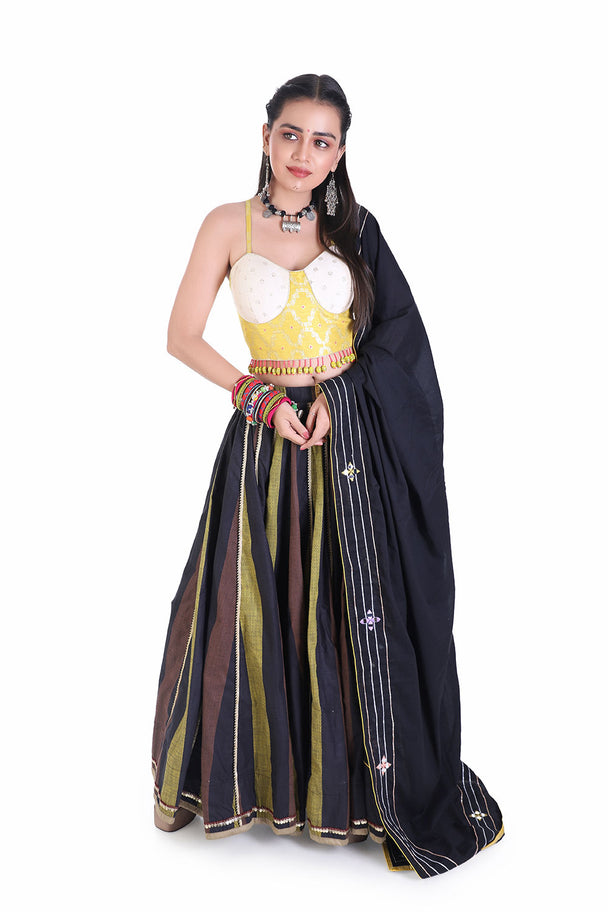 bold yellow tassel choli with lehenga and black mirror dupatta