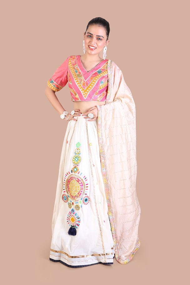 traditional cream with hand embroidered mirror work lehenga with pink blouse