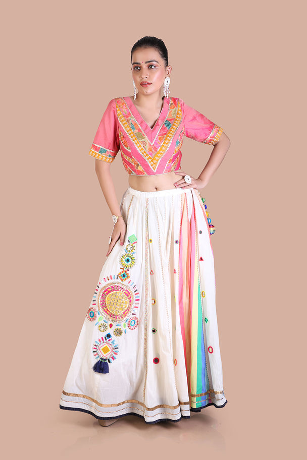 traditional cream with hand embroidered mirror work lehenga with pink blouse