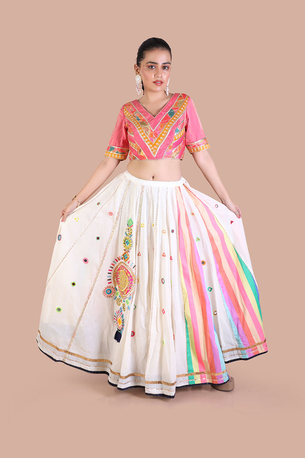 traditional cream with hand embroidered mirror work lehenga with pink blouse