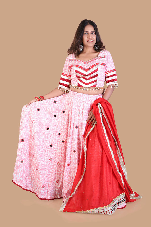 pastel pink printed lehenga with striped blouse & red dupatta