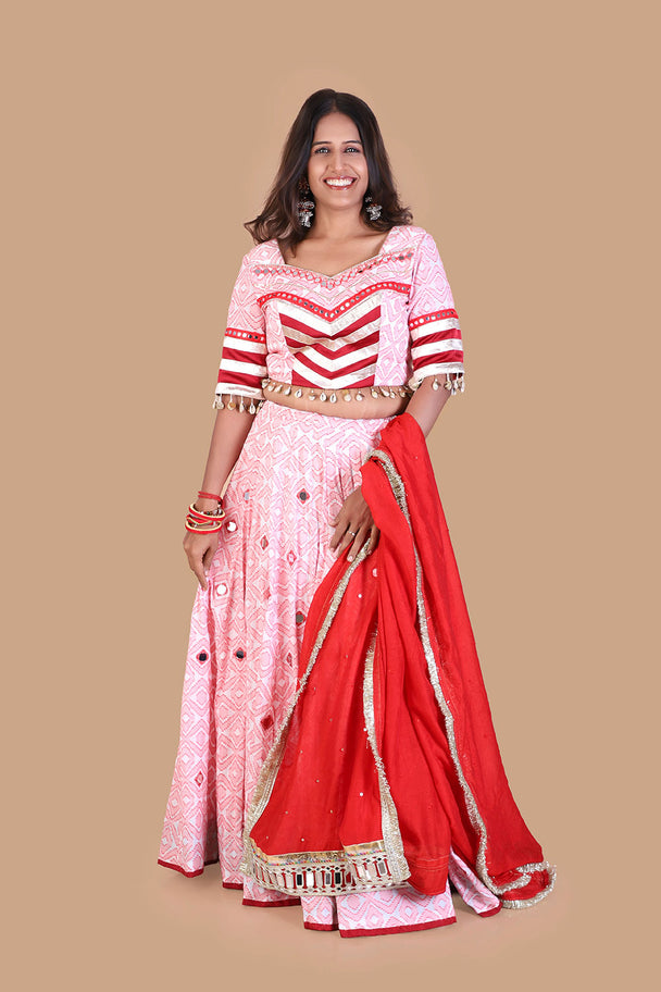 pastel pink printed lehenga with striped blouse & red dupatta