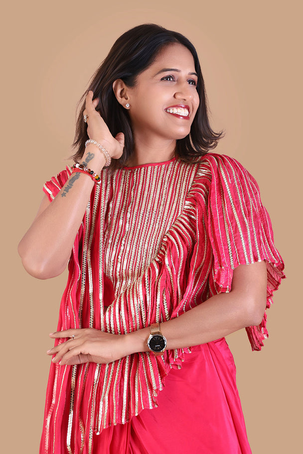 coral red striped tunic with matching flared palazzo pants