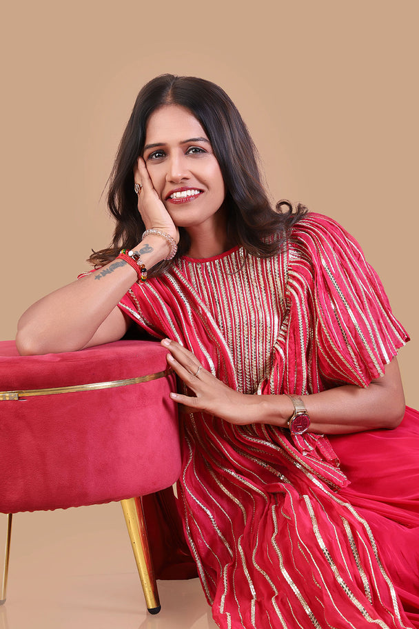 coral red striped tunic with matching flared palazzo pants