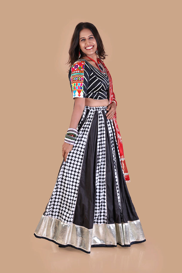black & white printed lehenga with red printed dupatta