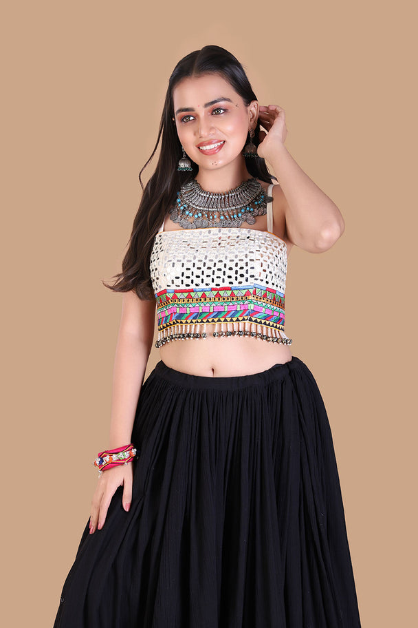 black flared lehenga with multicolor embroidered blouse & metallic border