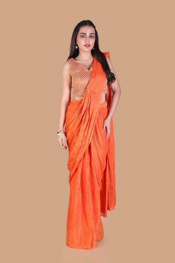 vibrant orange saree with textured embroidered blouse