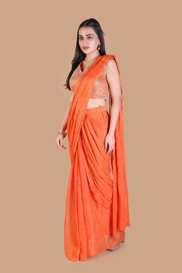 vibrant orange saree with textured embroidered blouse