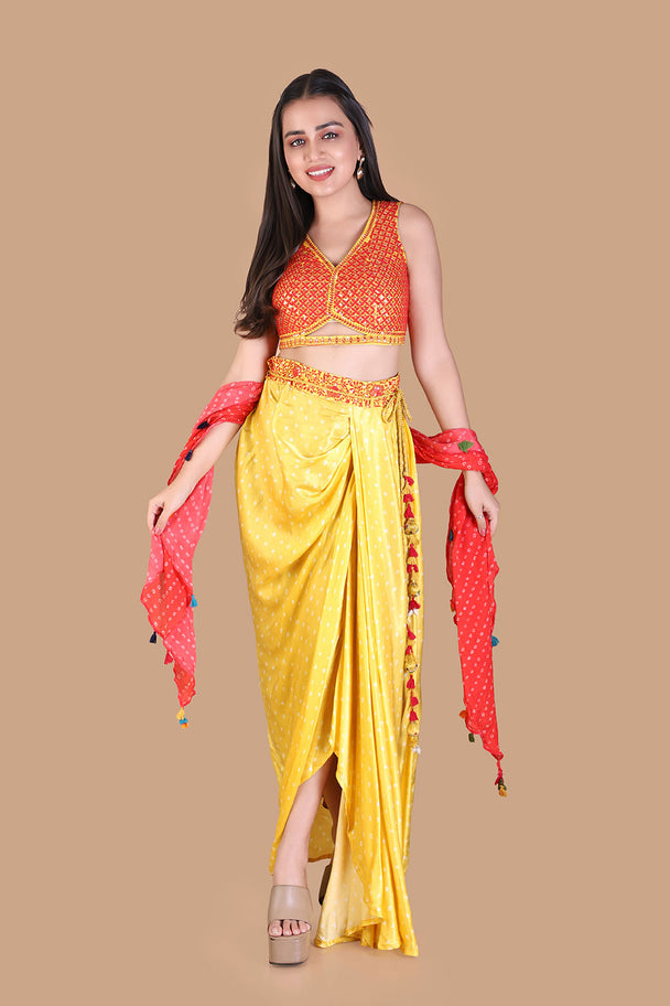 yellow draped dhoti pants with embroidered orange blouse & pink dupatta