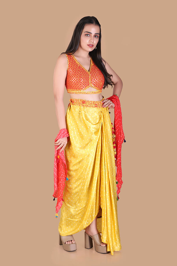 yellow draped dhoti pants with embroidered orange blouse & pink dupatta