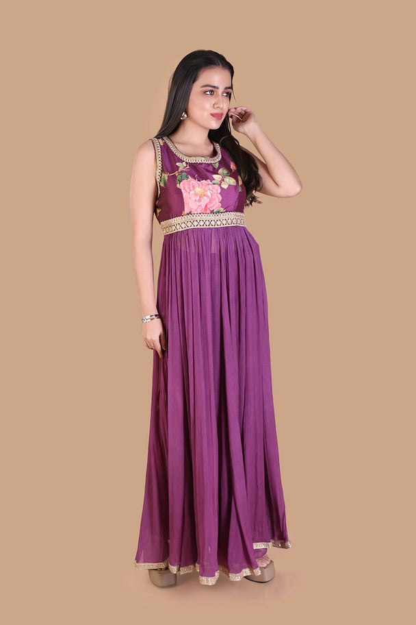 deep purple embroidered flared gown with statement blouse