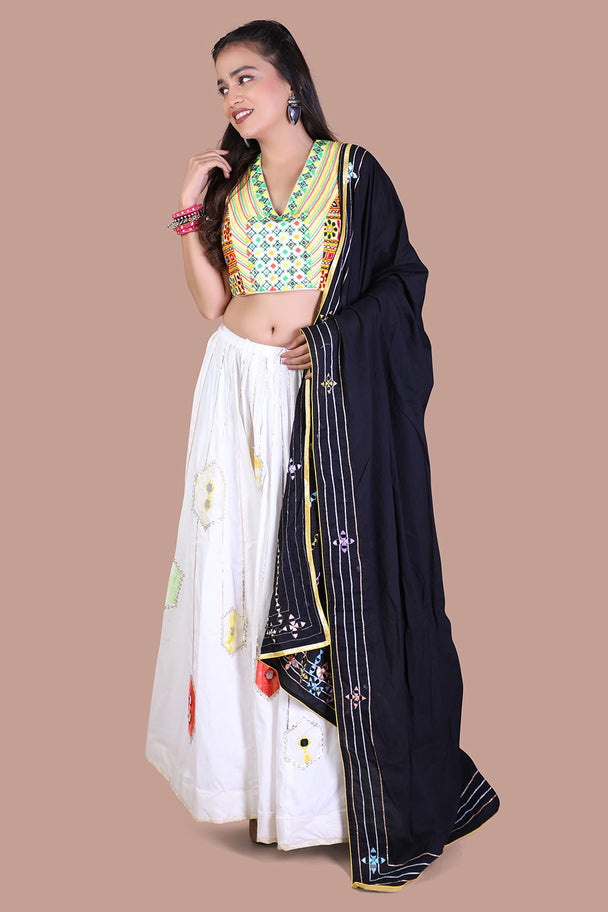 ivory floral lehenga with green blouse & black dupatta