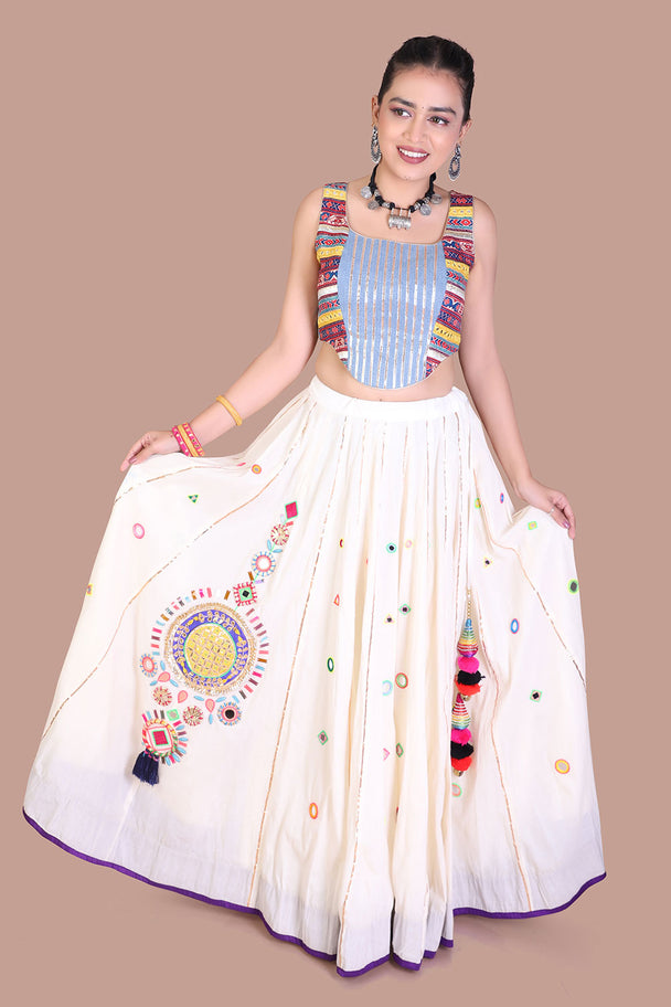 ivory printed lehenga with multicolor motifs & blue blouse