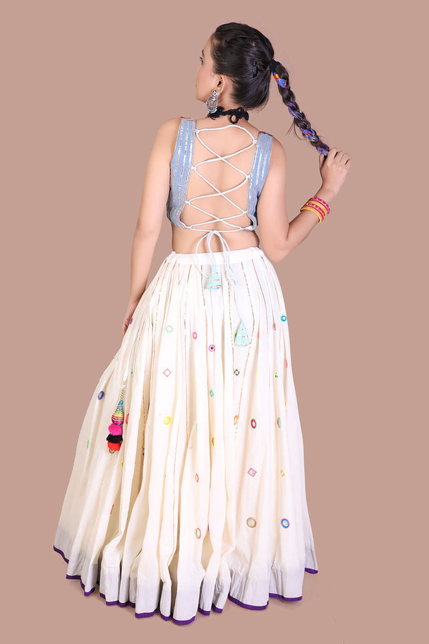 ivory printed lehenga with multicolor motifs & blue blouse