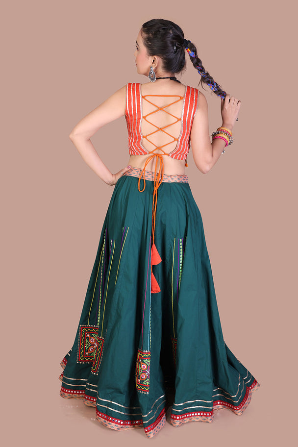 teal green lehenga with orange blouse & mustard dupatta