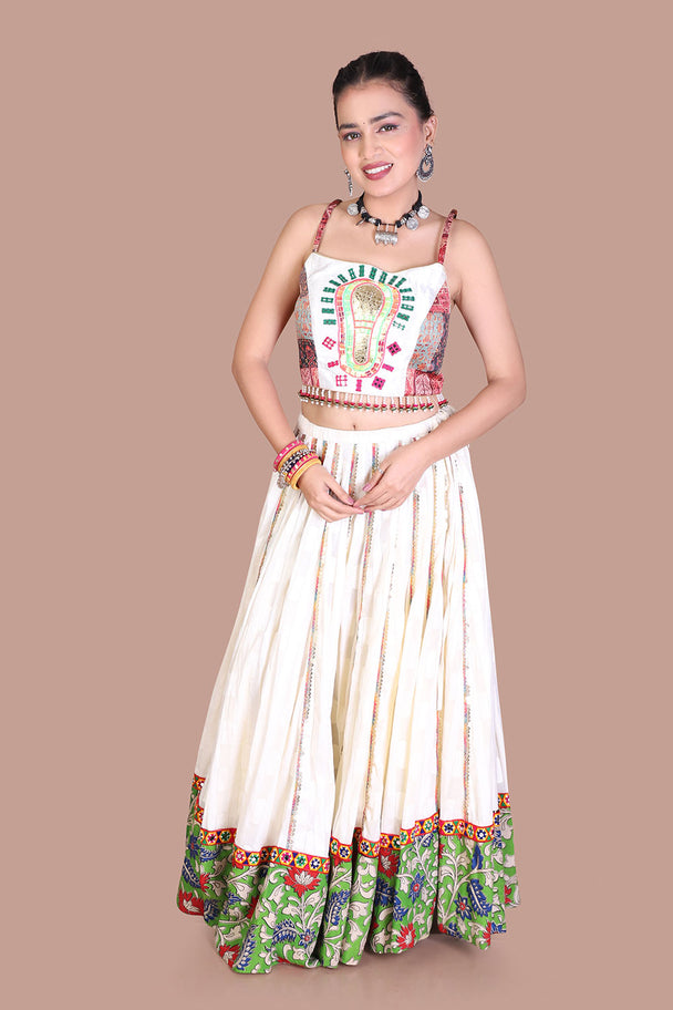 ivory floral lehenga with embroidered blouse & green printed border
