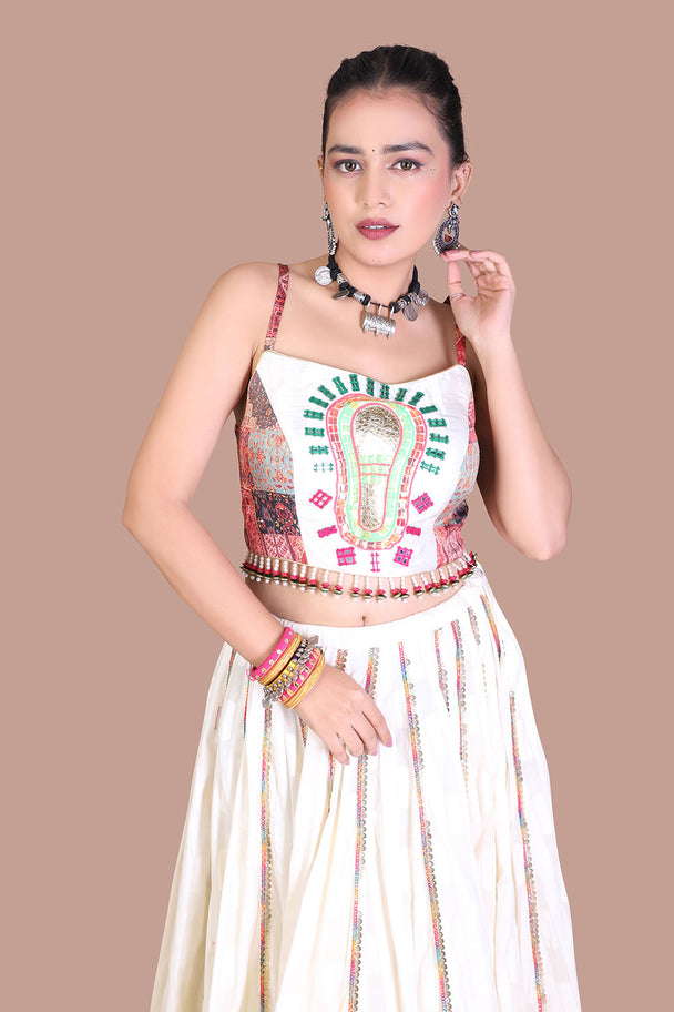 ivory floral lehenga with embroidered blouse & green printed border