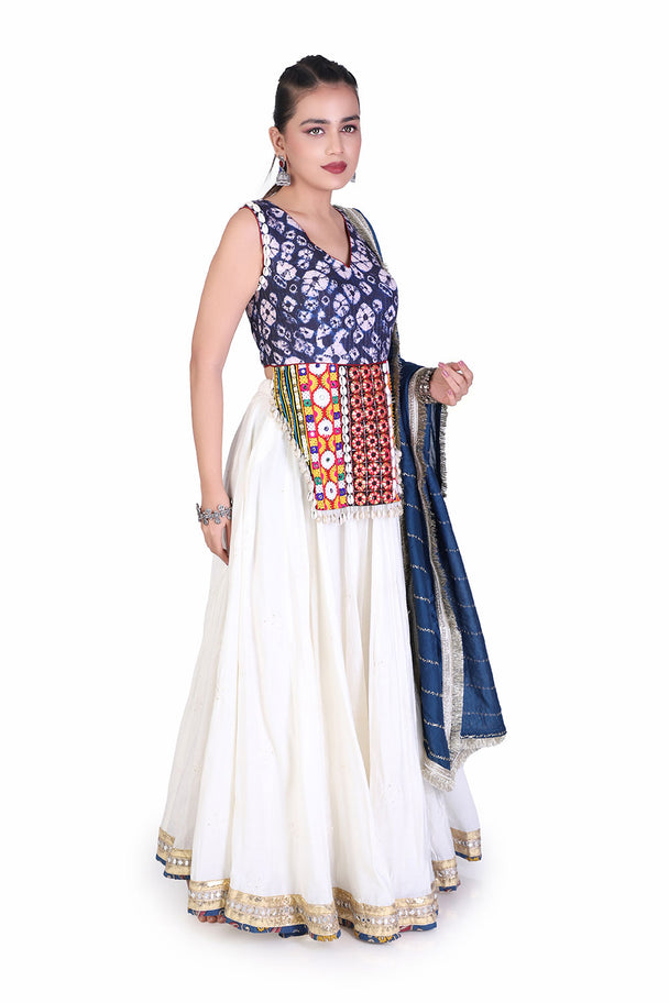 ivory printed lehenga with blue embroidered blouse & dupatta