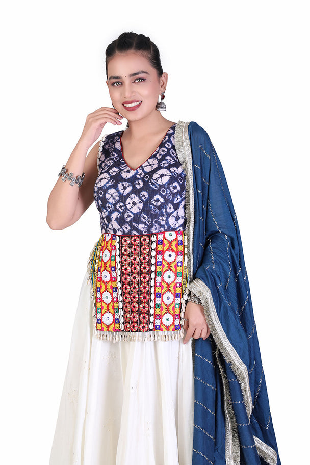ivory printed lehenga with blue embroidered blouse & dupatta