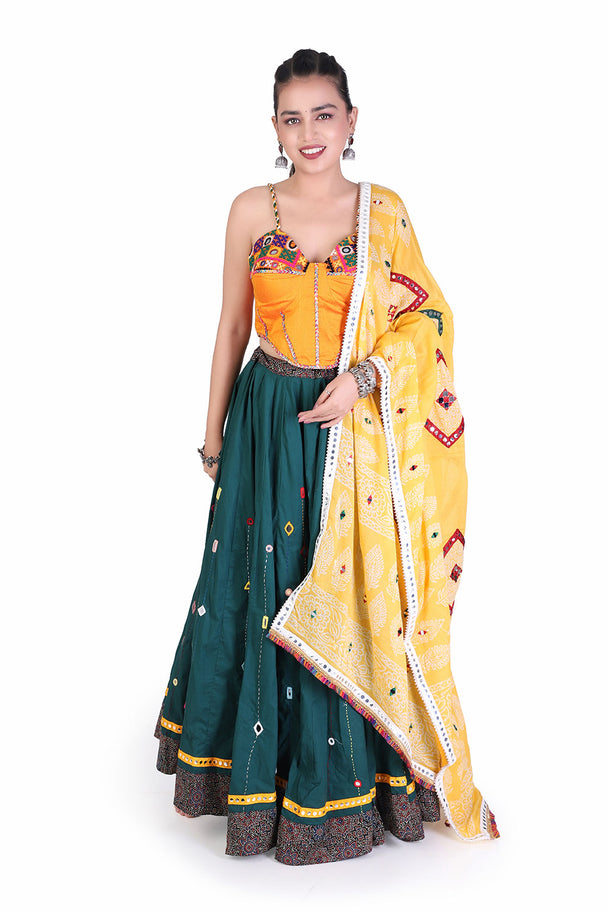 deep teal lehenga with orange blouse & mustard dupatta