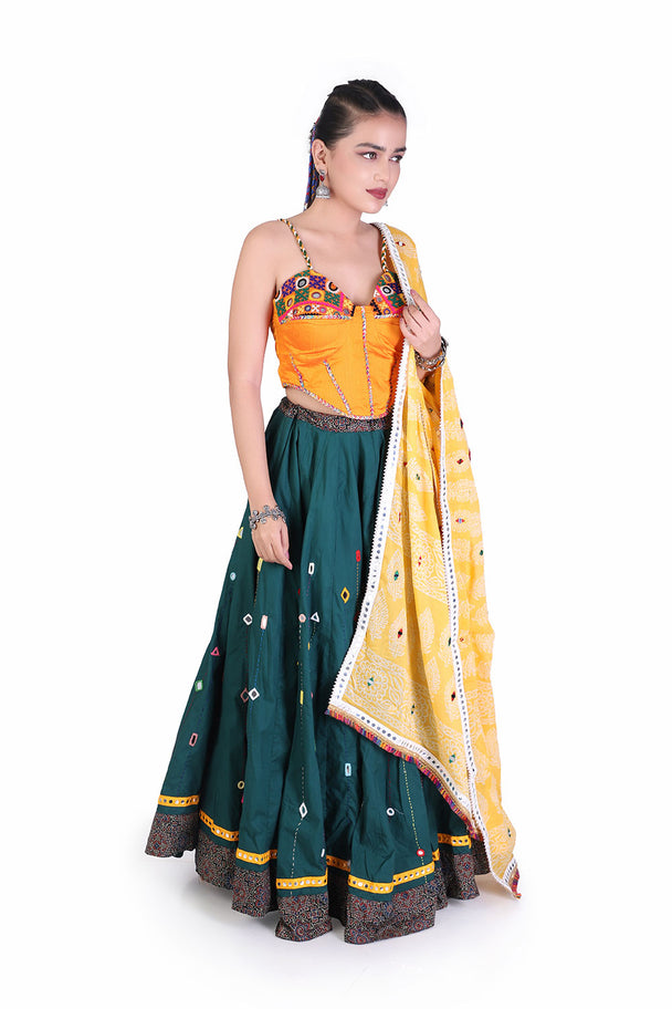 deep teal lehenga with orange blouse & mustard dupatta