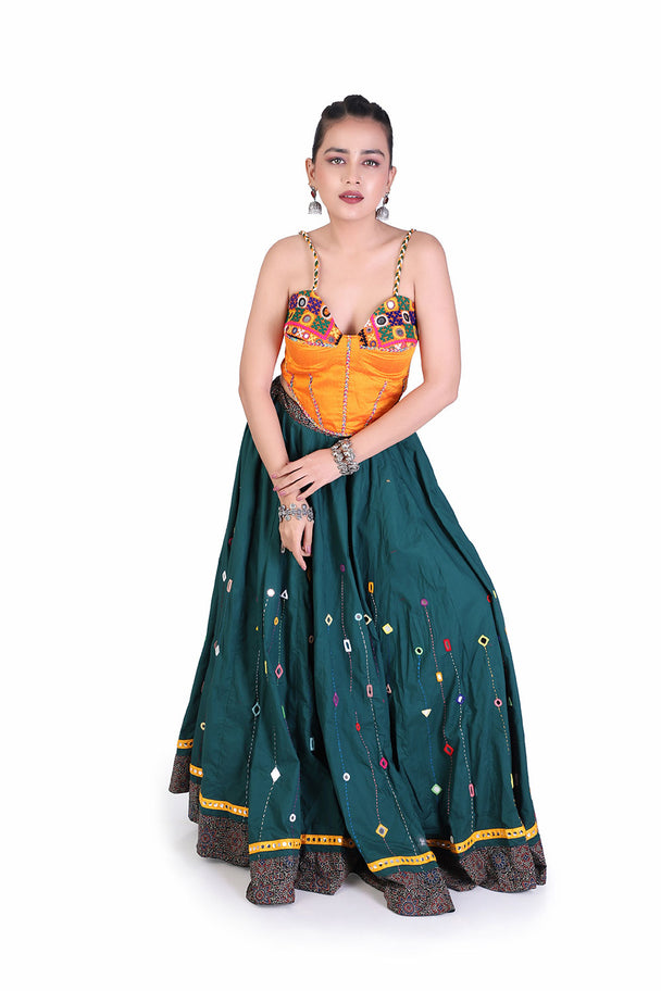 deep teal lehenga with orange blouse & mustard dupatta