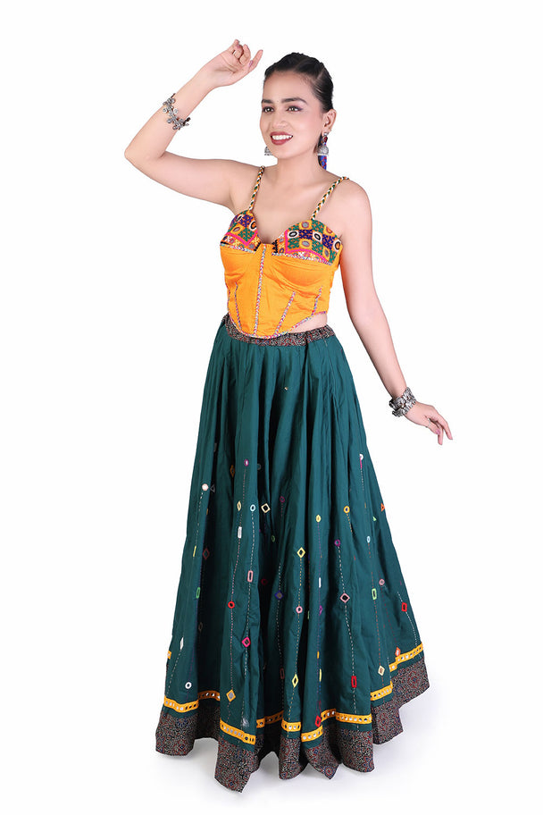 deep teal lehenga with orange blouse & mustard dupatta