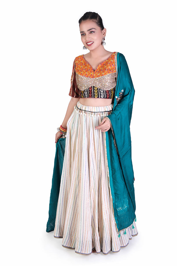 ivory lehenga with orange embroidered blouse & coordinated dupatta