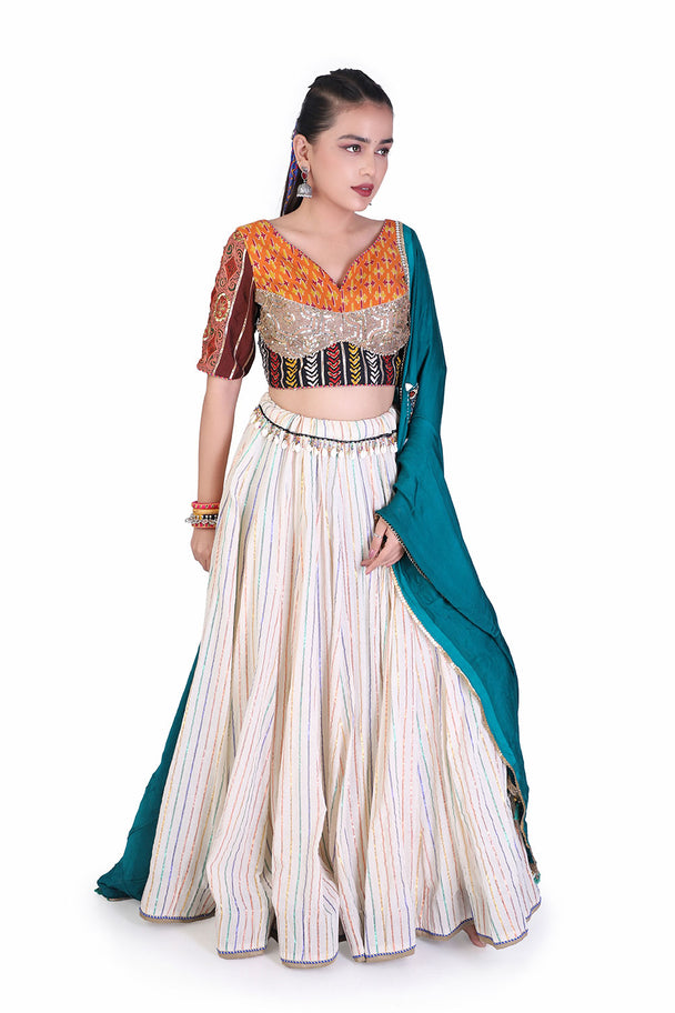 ivory lehenga with orange embroidered blouse & coordinated dupatta