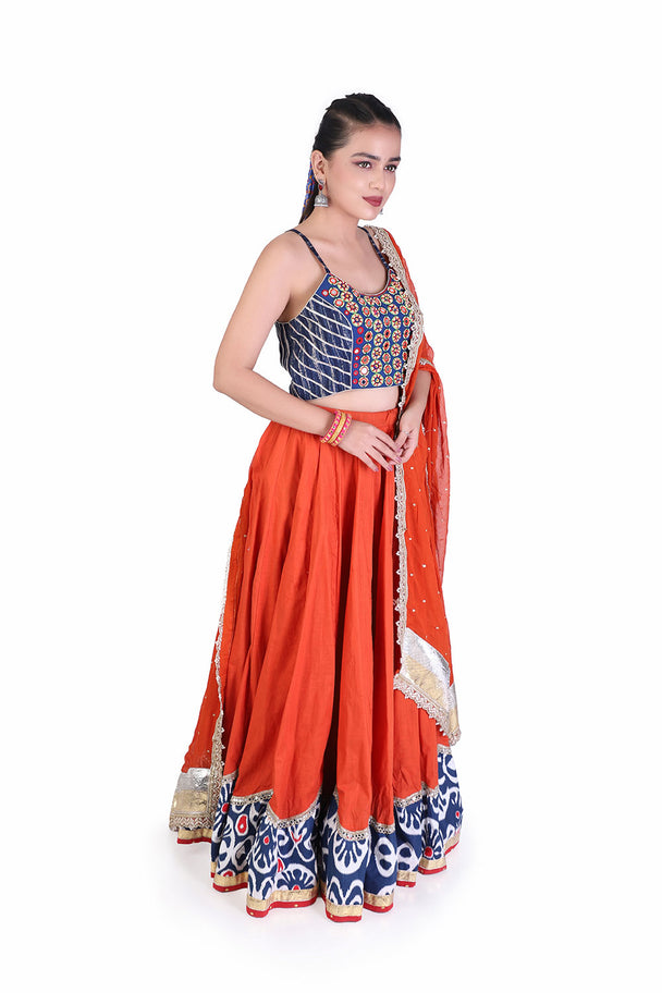 orange lehenga with blue embroidered blouse & printed border